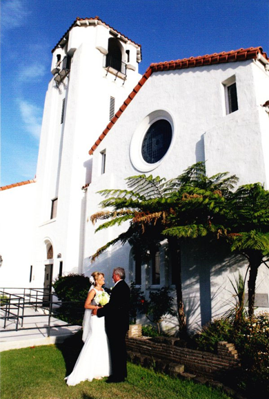 bride and groom outside Chino United Methodist Church